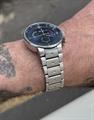 movado pilot se blue bezel perpetual